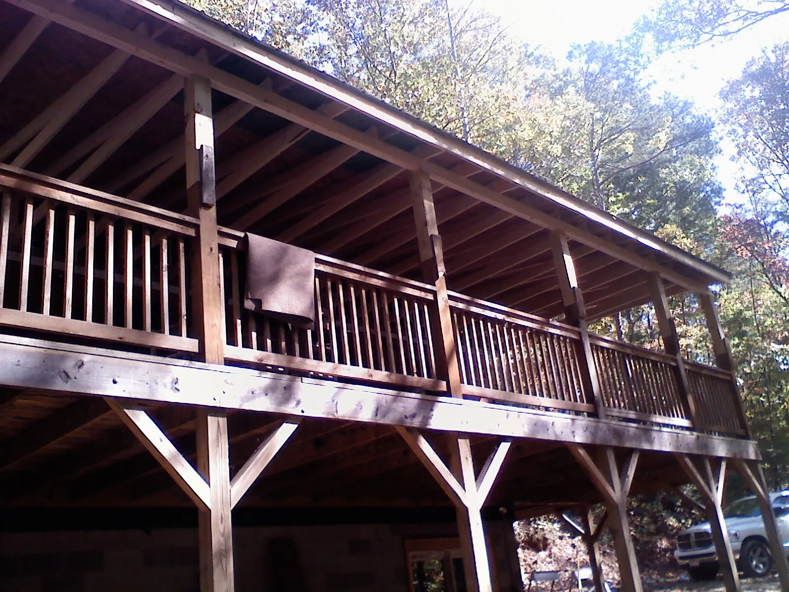 Timber framing under a new elevated porch and deck — Roof Leak Repair in Midway Park by Roofing Brothers